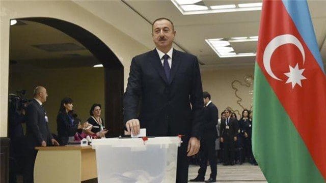 Azery President Ilham Aliyev casts his ballot in Baku on November 1, 2015, during parliamentary elections in Azerbaijan. (Reuters)