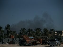 Smoke rises from Mitiga International Airport in Tripoli, Libya, Feb. 28, 2020. The forces of the UN-backed Libyan government said on Friday that the rival east-based army attacked the Mitiga International Airport in Tripoli with heavy shelling. (Photo by Amru Salahuddien/Xinhua)