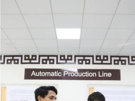 Students learn elevator operation on a class of automation and robotics of a Luban Workshop in Pakistan. (Photo courtesy of the Pakistan Luban Workshop)