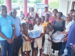 The Sos Children S Villages Delegation Handing Over The Items To The Mafi Aklamador Flood Victims